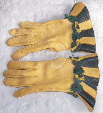 gold and green leather riding gloves