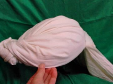 photo of starting to cover the helmet with turban fabric